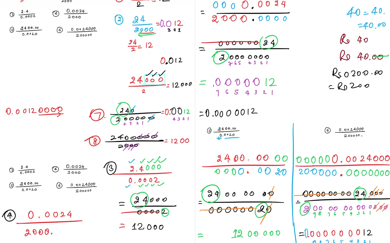 Decimal division worked on a class whiteboard with every step colour-coded